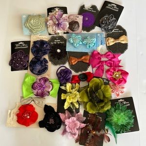 Bundle 25 bows, flowers, clips, barrettes, pony, pins. New never used.